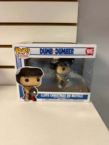 Funko Pop Lloyd Christmas on Bicycle